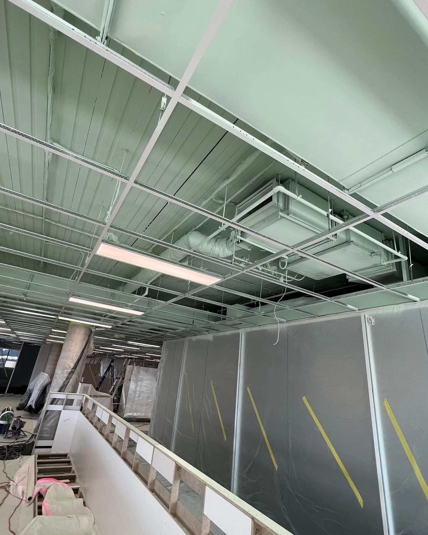 Walls and a ceiling grid in a commercial build-out